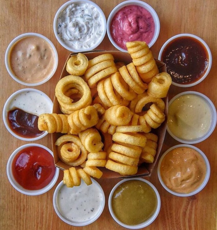 Curly fries with dipping sauces