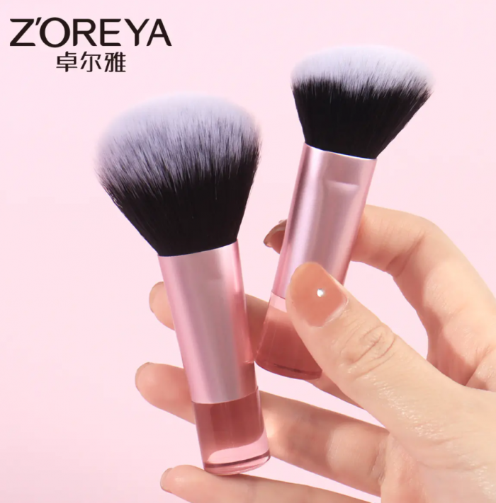 Essential makeup brushes add powderpuff